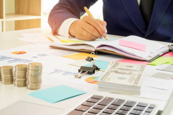 business-finance-concept-business-people-are-analyzing-the-work-and-taking-notes-.jpg