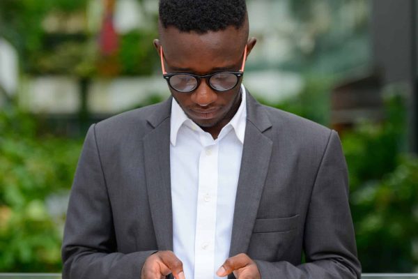 young-african-businessman-in-the-city-outdoors.jpg